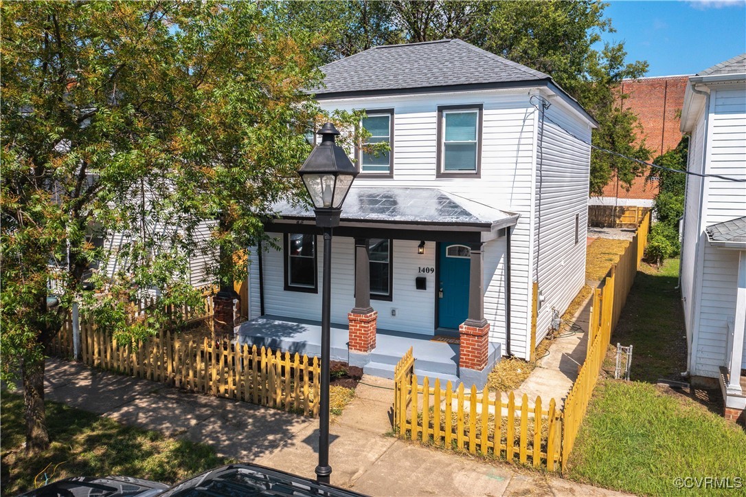 1409 Decatur Street Richmond, VA 23224 - Photo 1 of 33 View of front of property with covered porch, roof