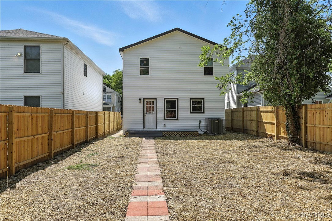 1409 Decatur Street Richmond, VA 23224 - Photo 15 of 33 Back of house featuring a fenced backyard