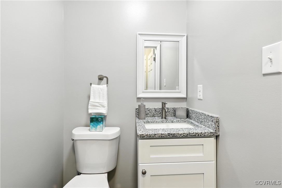 1409 Decatur Street Richmond, VA 23224 - Photo 22 of 33 Bathroom featuring toilet and vanity