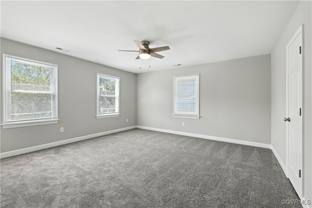 1409 Decatur Street Richmond, VA 23224 - Photo 23 of 33 Empty room featuring a ceiling fan, healthy amount