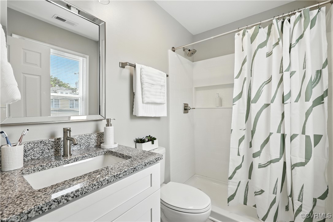 1409 Decatur Street Richmond, VA 23224 - Photo 26 of 33 Bathroom with vanity and curtained shower