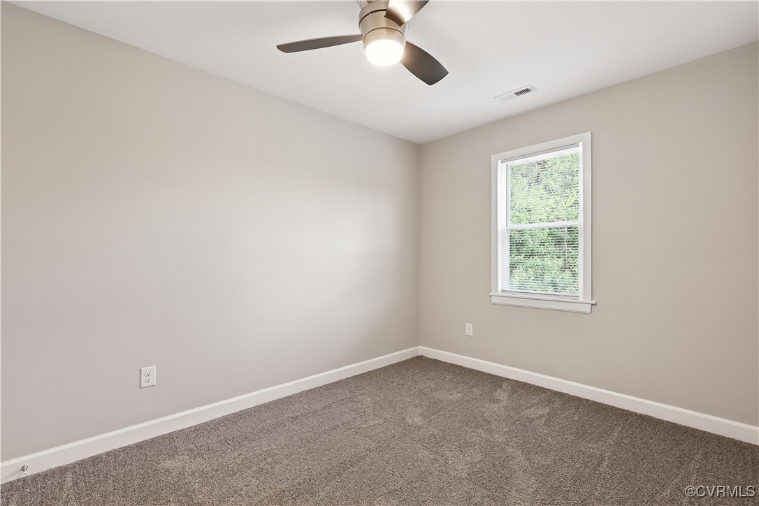1409 Decatur Street Richmond, VA 23224 - Photo 30 of 33 Empty room featuring ceiling fan and dark colored