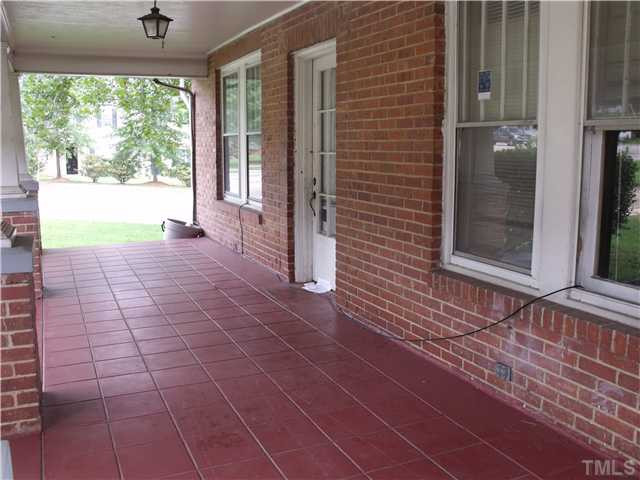 2909 Garner Road Raleigh, NC 27610 - Photo 2 of 8 a view of a brick house with a large window