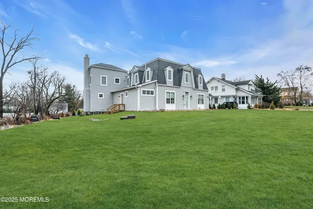 a front view of building with yard