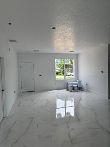a view of a livingroom with a window