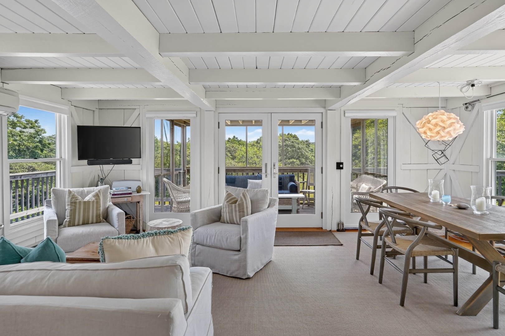 28 Black Point Road Chilmark, MA 02535 - Photo 8 of 56 Living room opens to a screened porch and a side deck.
