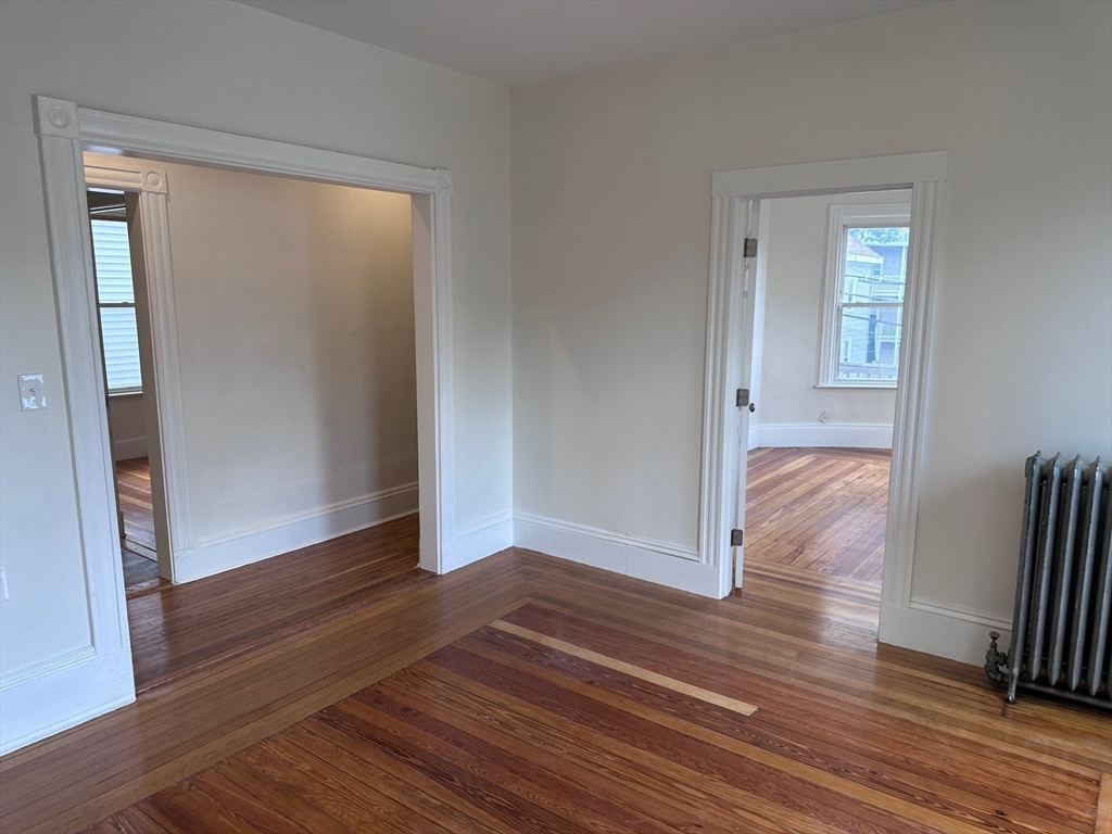 27 Bailey Street, Unit 2 Boston, MA 02124 - Photo 3 of 12 a view of entryway with wooden floor