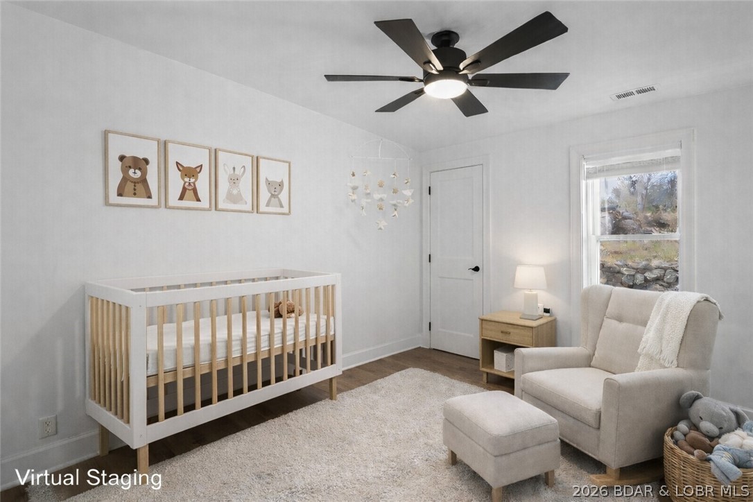1718 South Aurora Street Eldon, MO 65026 - Photo 16 of 41 Bedroom 2 virtually staged as a nursery