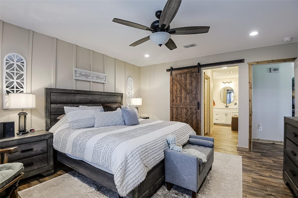 2683 Bells Chapel Road Palmer, TX 75152 - Photo 12 of 28 a bedroom with a bed and wooden floor