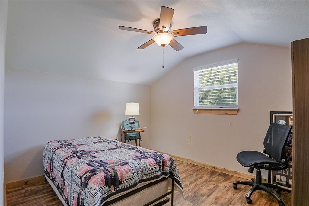 2683 Bells Chapel Road Palmer, TX 75152 - Photo 17 of 28 a bedroom with bed and a window