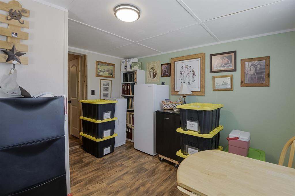 2683 Bells Chapel Road Palmer, TX 75152 - Photo 18 of 28 a view of a livingroom with furniture and workspace