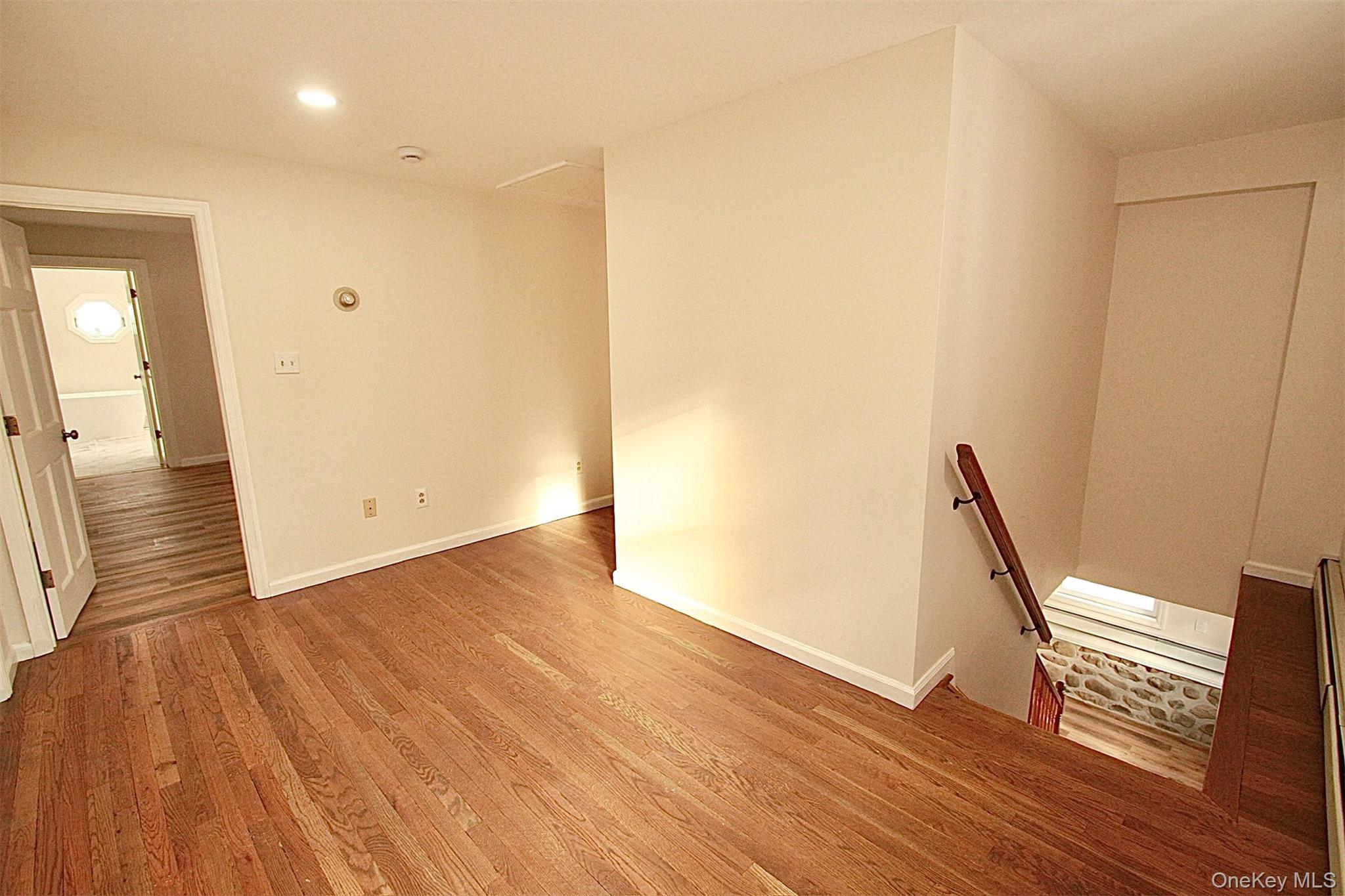 12 Clove Road Salisbury Mills, NY 12577 - Photo 13 of 28 a view of wooden floor and chair in a room