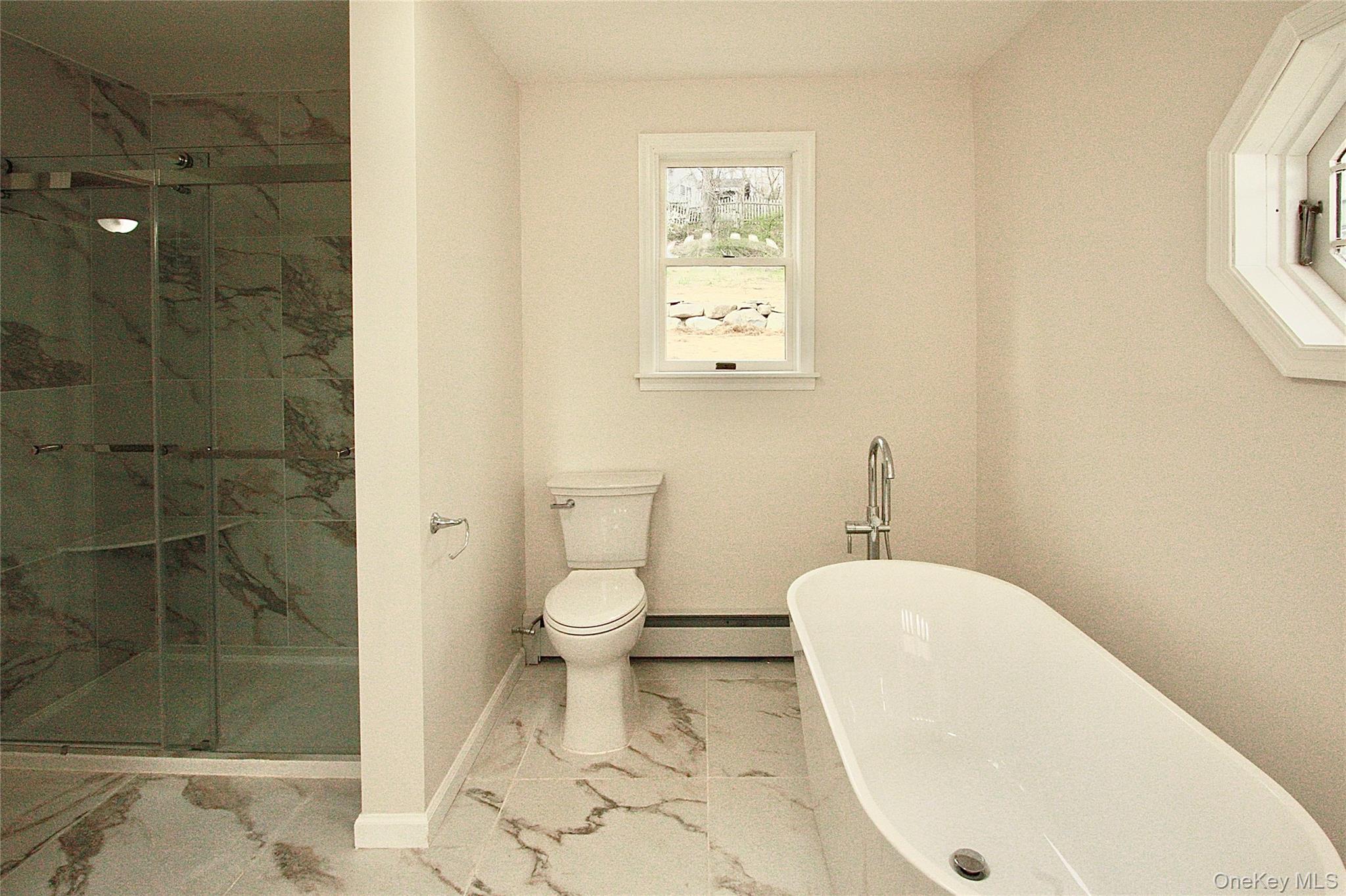 12 Clove Road Salisbury Mills, NY 12577 - Photo 17 of 28 a bathroom with a toilet and a shower