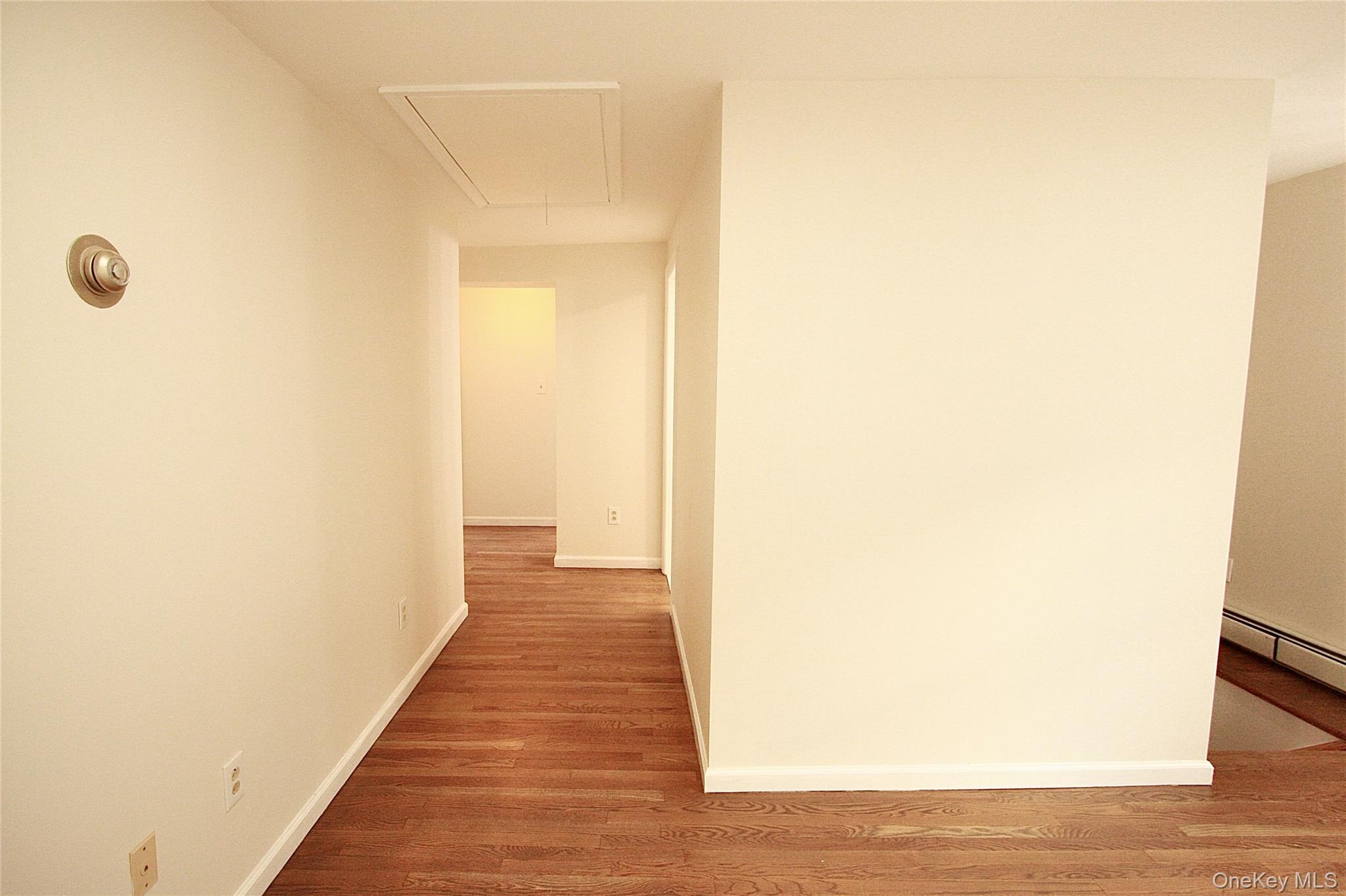 12 Clove Road Salisbury Mills, NY 12577 - Photo 18 of 28 a view of a hallway with wooden floor