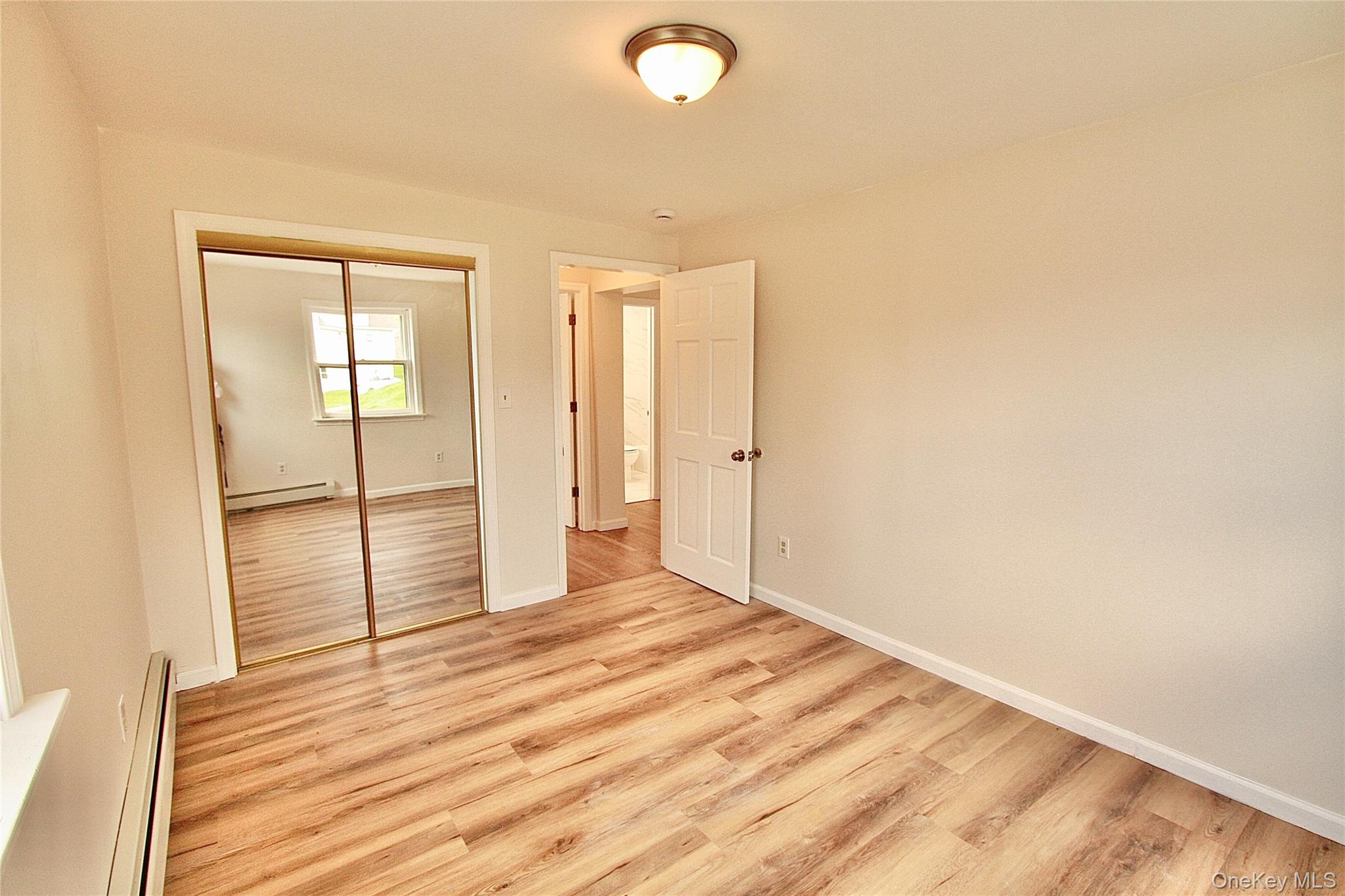12 Clove Road Salisbury Mills, NY 12577 - Photo 20 of 28 a view of a room with wooden floor and bathroom