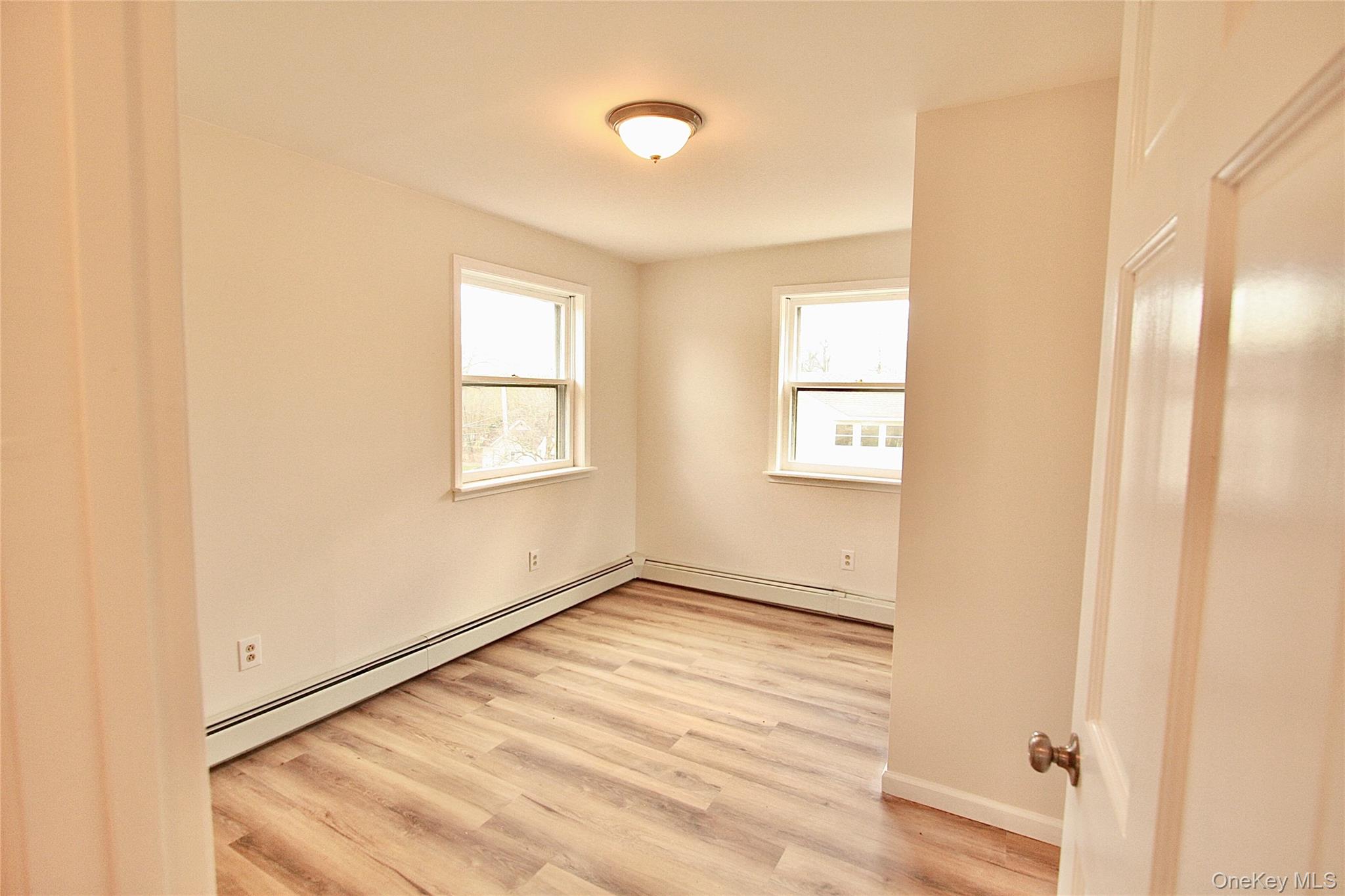 12 Clove Road Salisbury Mills, NY 12577 - Photo 22 of 28 a view of an empty room and window