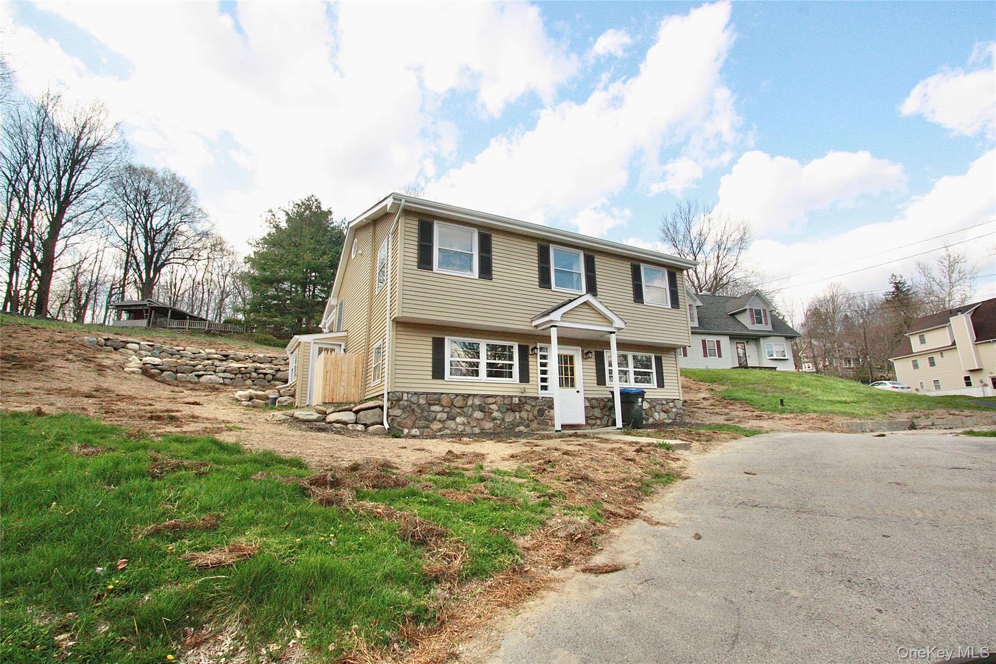 12 Clove Road Salisbury Mills, NY 12577 - Photo 3 of 28 a front view of a house with a yard