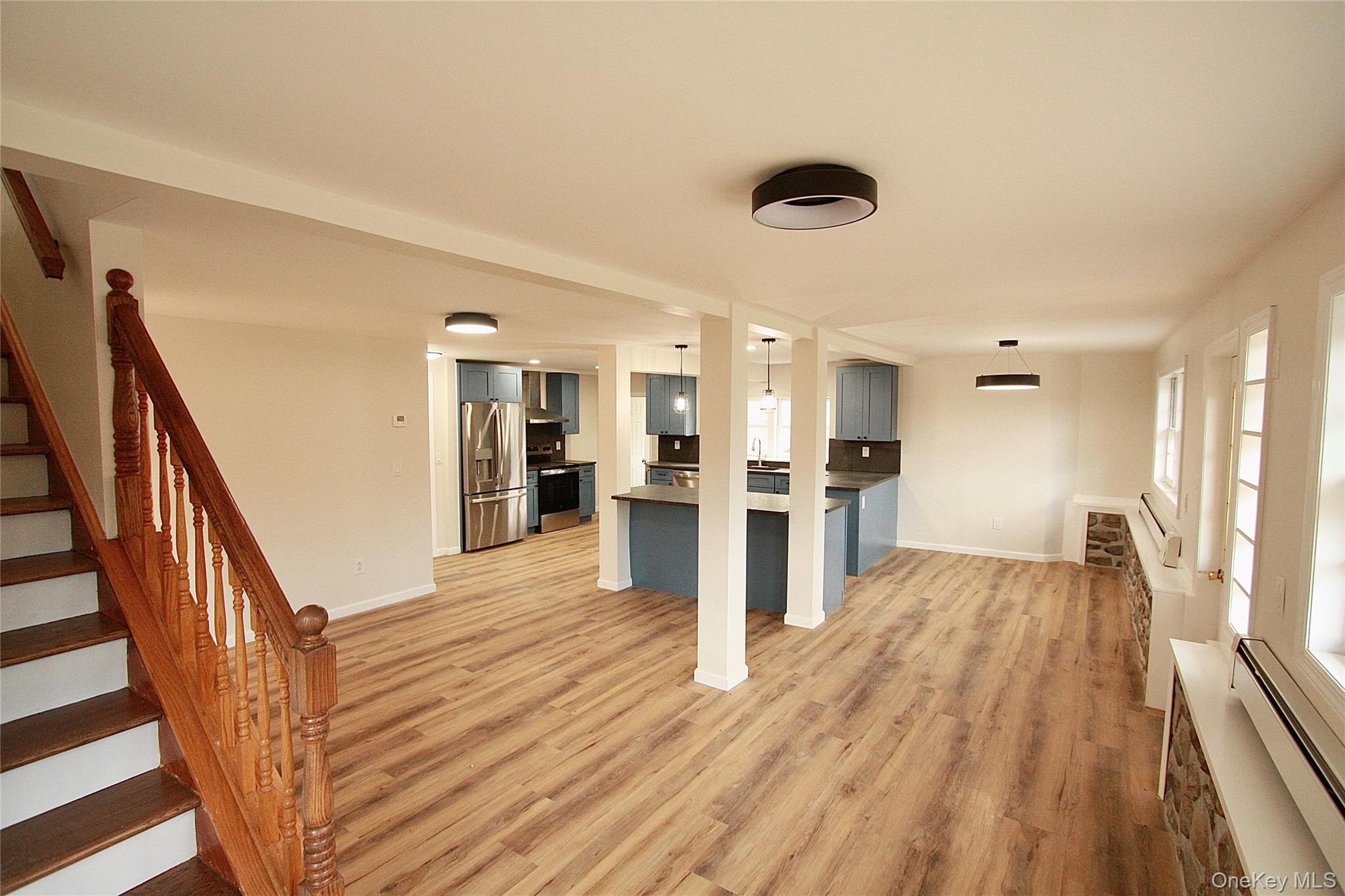 12 Clove Road Salisbury Mills, NY 12577 - Photo 8 of 28 a view of a living room with wooden floor