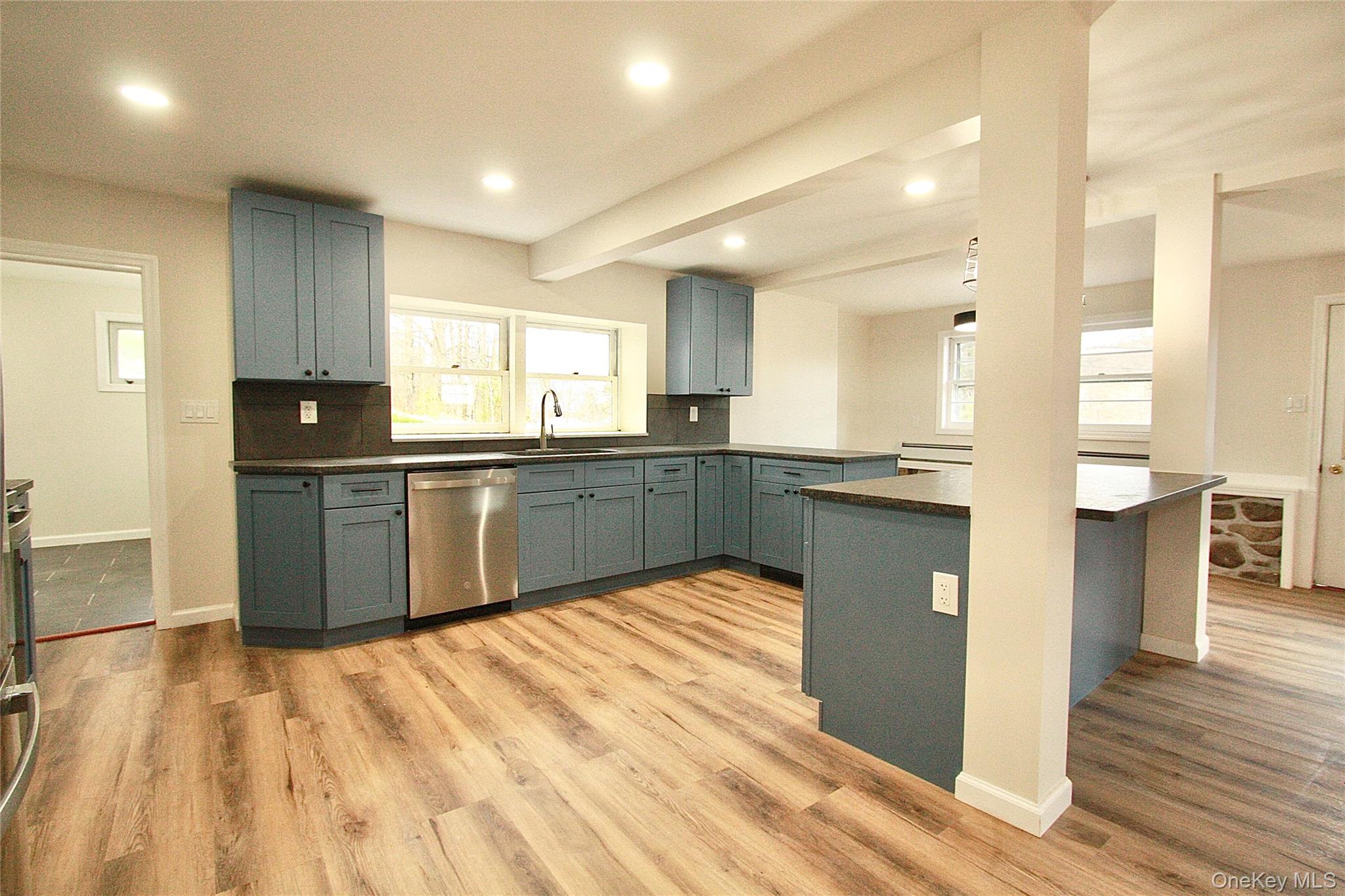 12 Clove Road Salisbury Mills, NY 12577 - Photo 10 of 28 a large kitchen with stainless steel appliances granite countertop a sink and cabinets