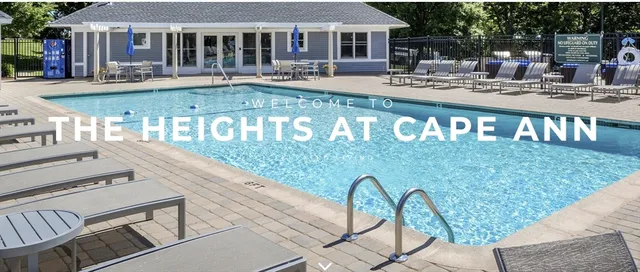 a view of a patio with couches table and chairs and potted plants