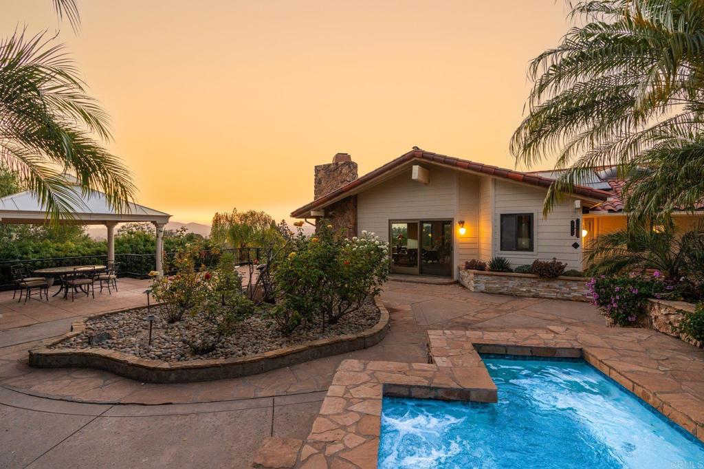 13319 Pacer Lane Poway, CA 92064 - Photo 61 of 75 a view of a house with backyard and sitting area