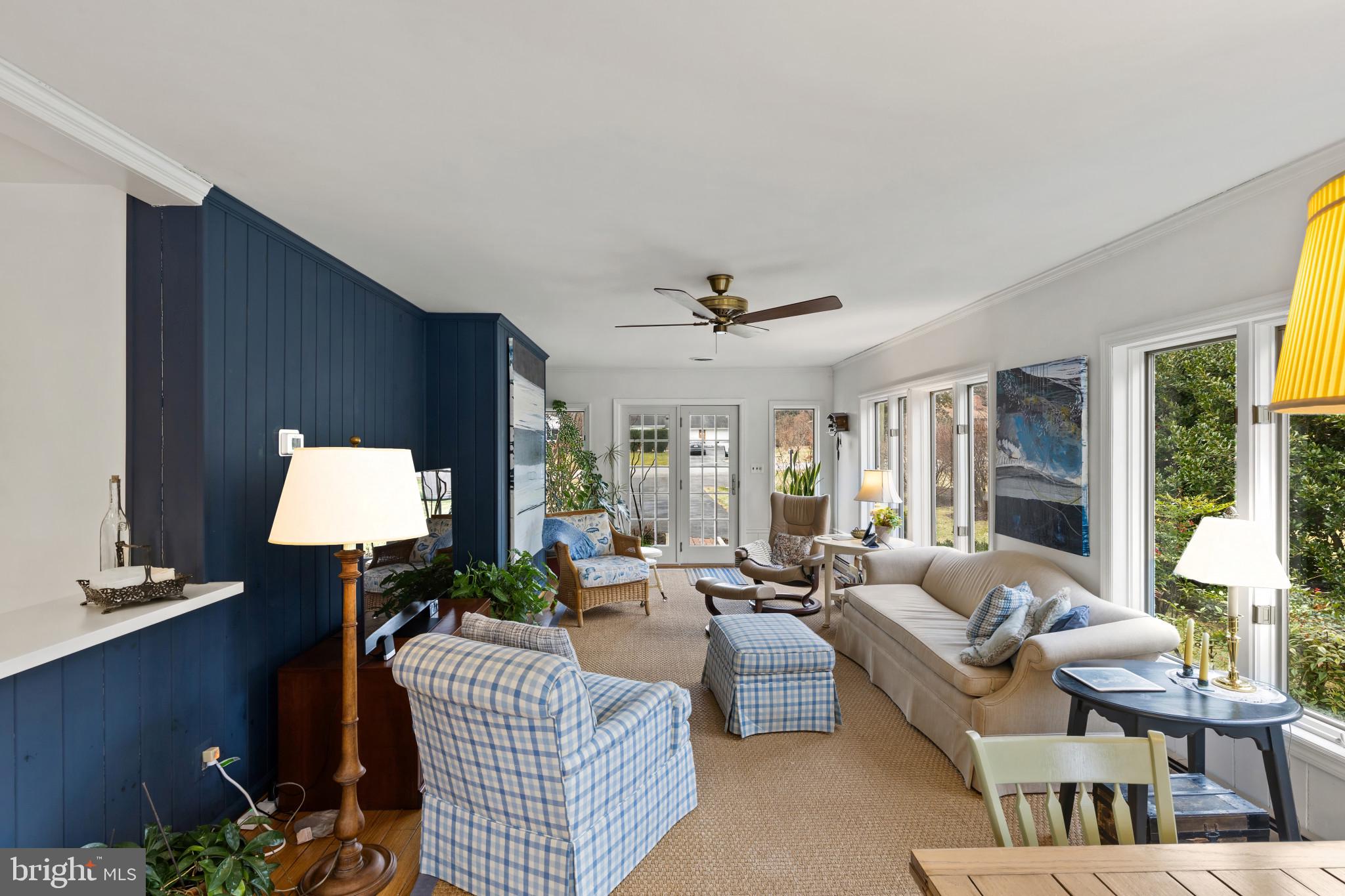 8419 High Ridge Road Ellicott City, MD 21043 - Photo 20 of 49 a living room with furniture and a lamp