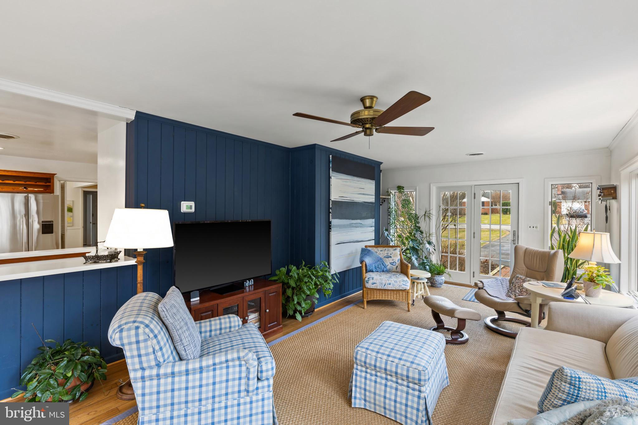 8419 High Ridge Road Ellicott City, MD 21043 - Photo 22 of 49 a living room with furniture ceiling fan and a window