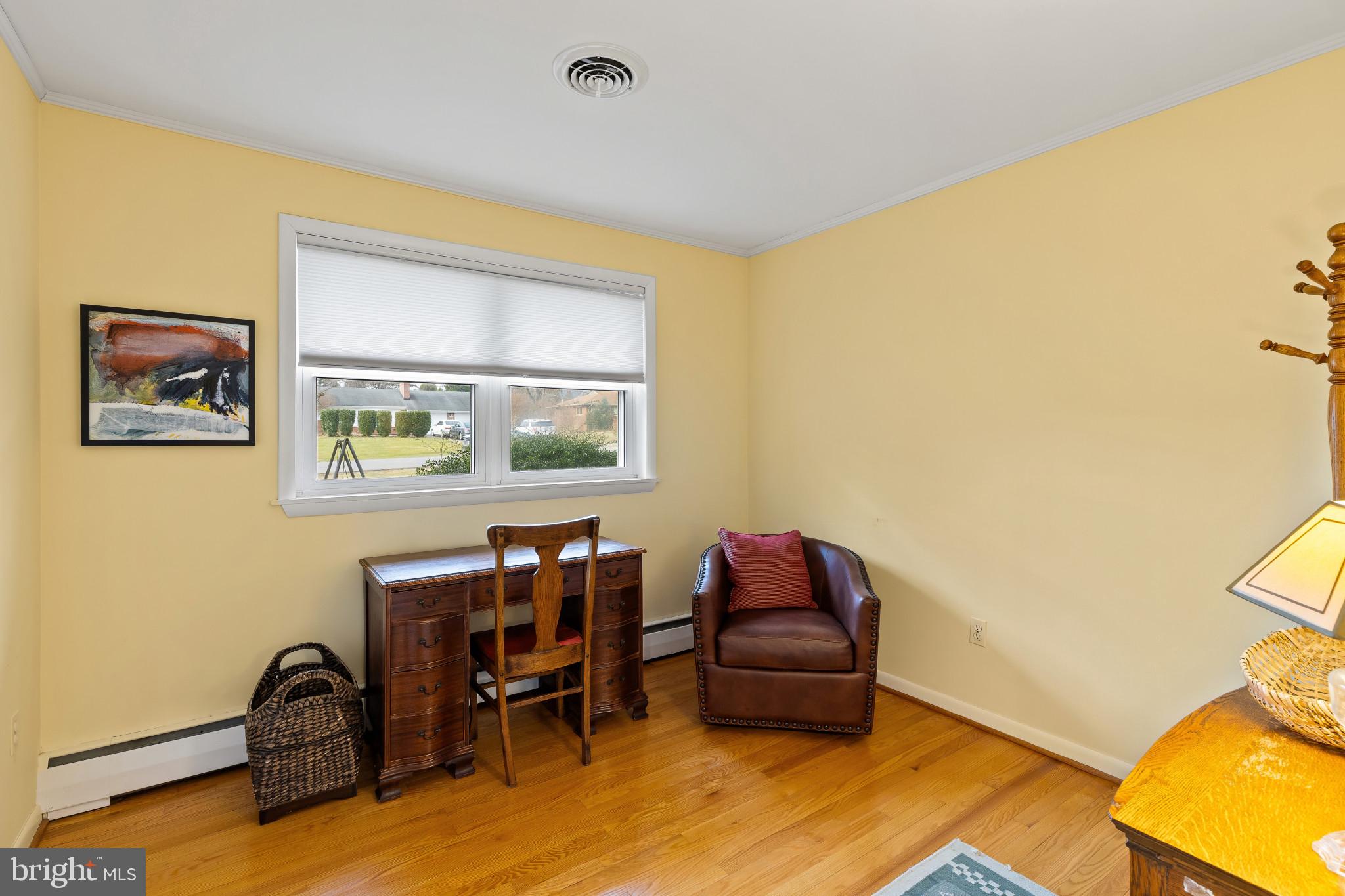 8419 High Ridge Road Ellicott City, MD 21043 - Photo 26 of 49 a living room with furniture and a window