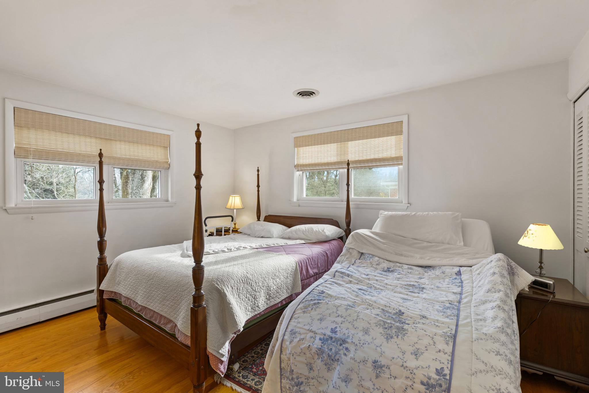 8419 High Ridge Road Ellicott City, MD 21043 - Photo 31 of 49 a bedroom with a bed and window