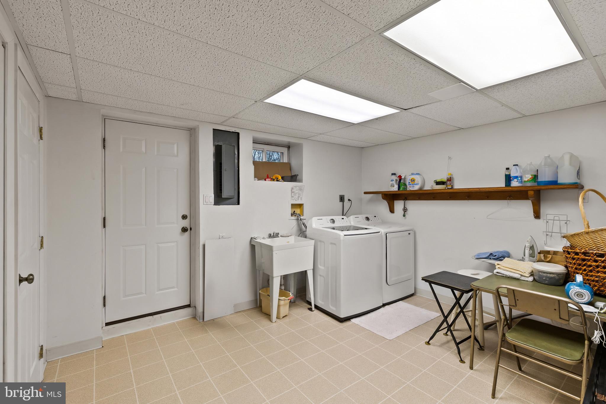 8419 High Ridge Road Ellicott City, MD 21043 - Photo 40 of 49 a view of a kitchen with cabinets and furniture