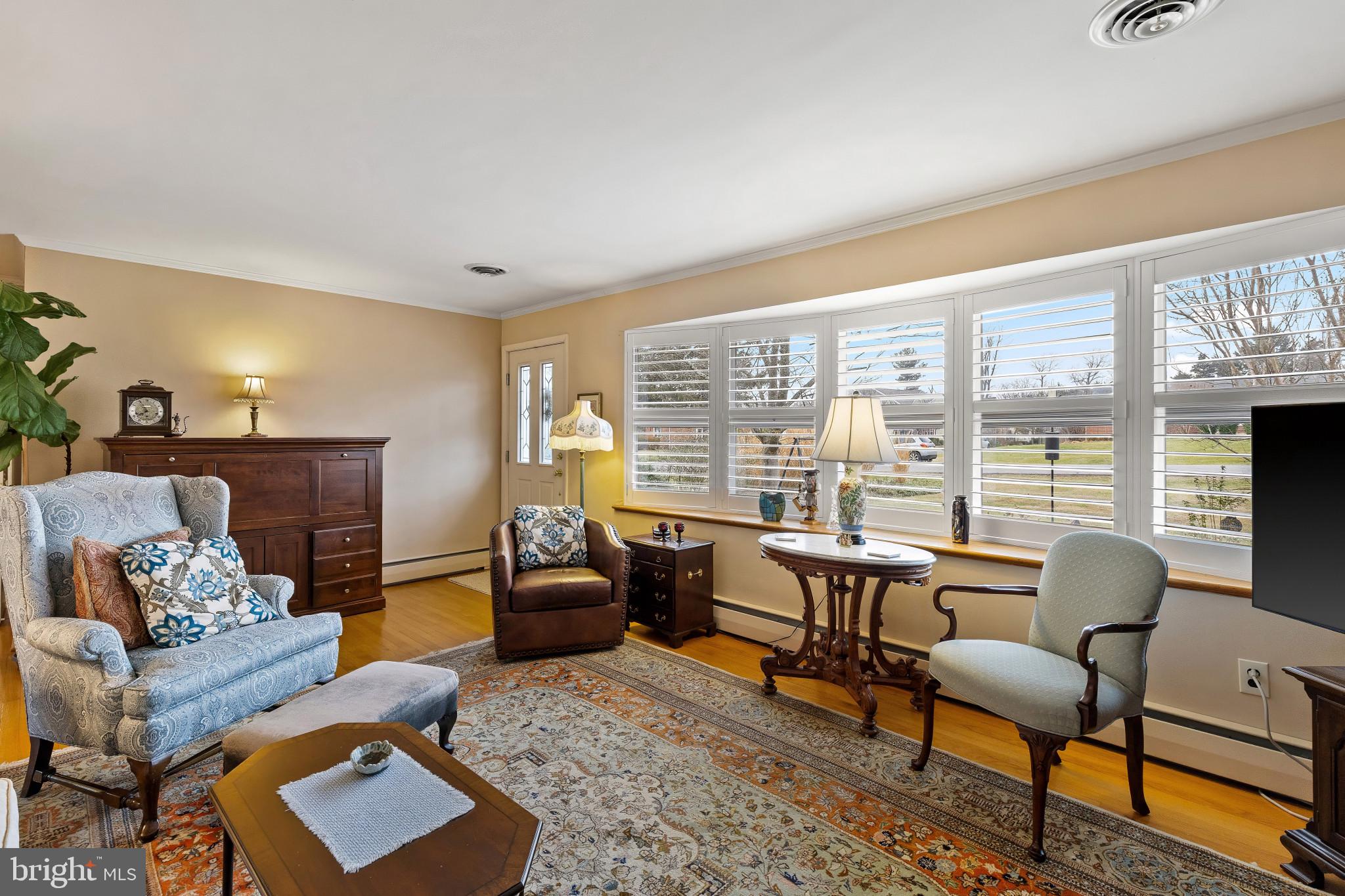 8419 High Ridge Road Ellicott City, MD 21043 - Photo 9 of 49 a living room with furniture and a floor to ceiling window