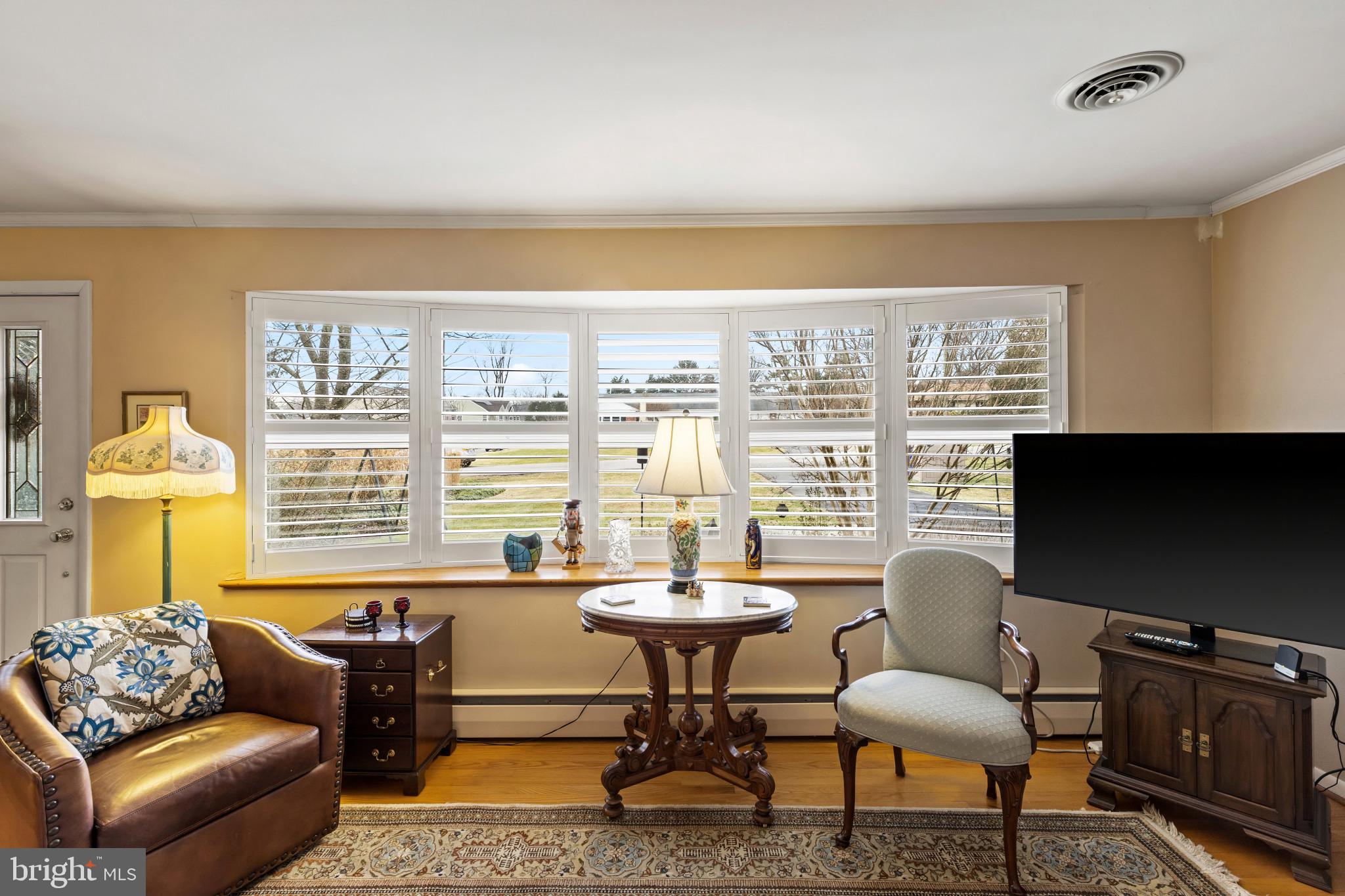8419 High Ridge Road Ellicott City, MD 21043 - Photo 10 of 49 a living room with furniture and a flat screen tv