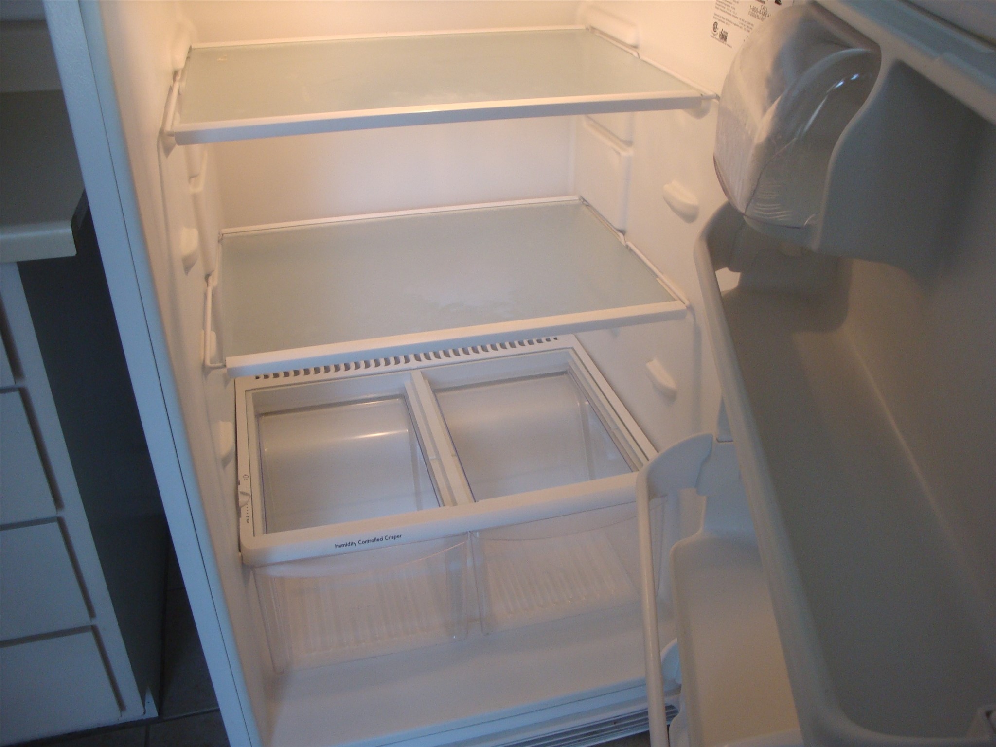3416 Morrison Street, Unit 7 Houston, TX 77009 - Photo 19 of 21 Nice and clean refrigerator with glass sheleves. Kitchen also has a gas stove/oven.