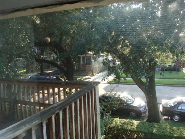 a view of a street from a yard