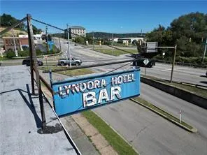 a view of a street with benches