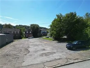 a view of a backyard of a house
