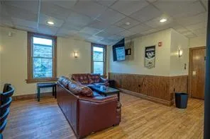 a living room with furniture and window