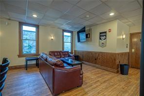 1 Main Street Lyndora, PA 16045 - Photo 6 of 17 a living room with furniture and window