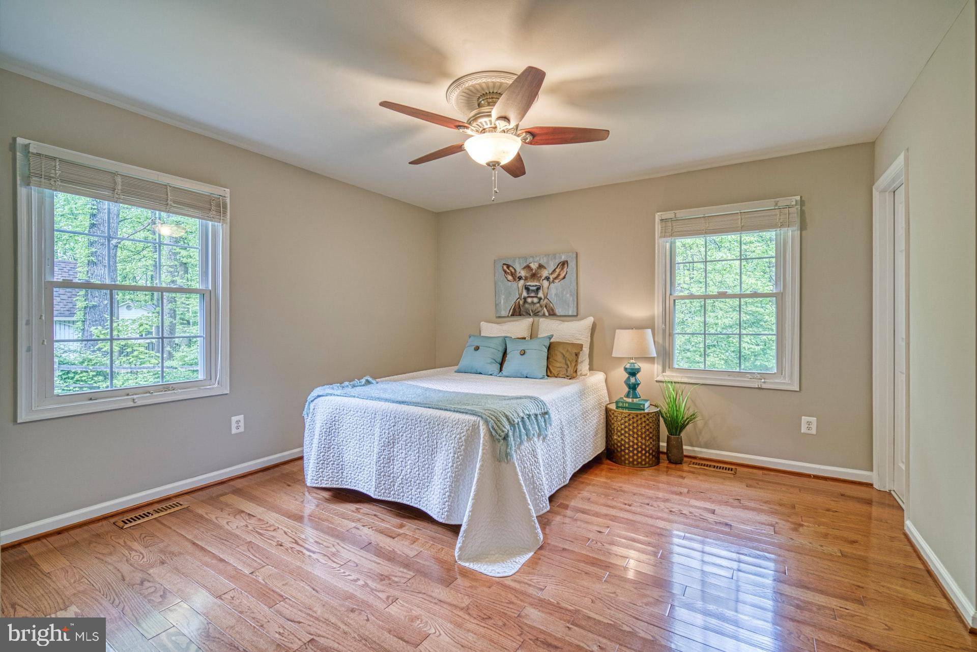 4913 Pheasant Ridge Road Fairfax, VA 22030 - Photo 13 of 33 Master bedroom with hardwood floors
