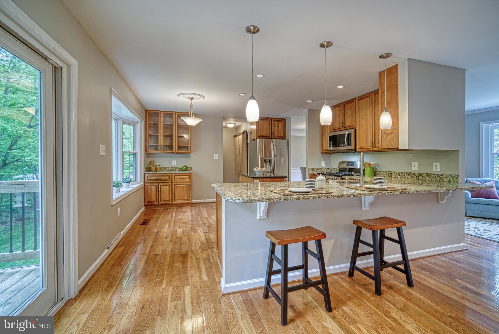 4913 Pheasant Ridge Road Fairfax, VA 22030 - Photo 7 of 33 Updated kitchen with breakfast bar