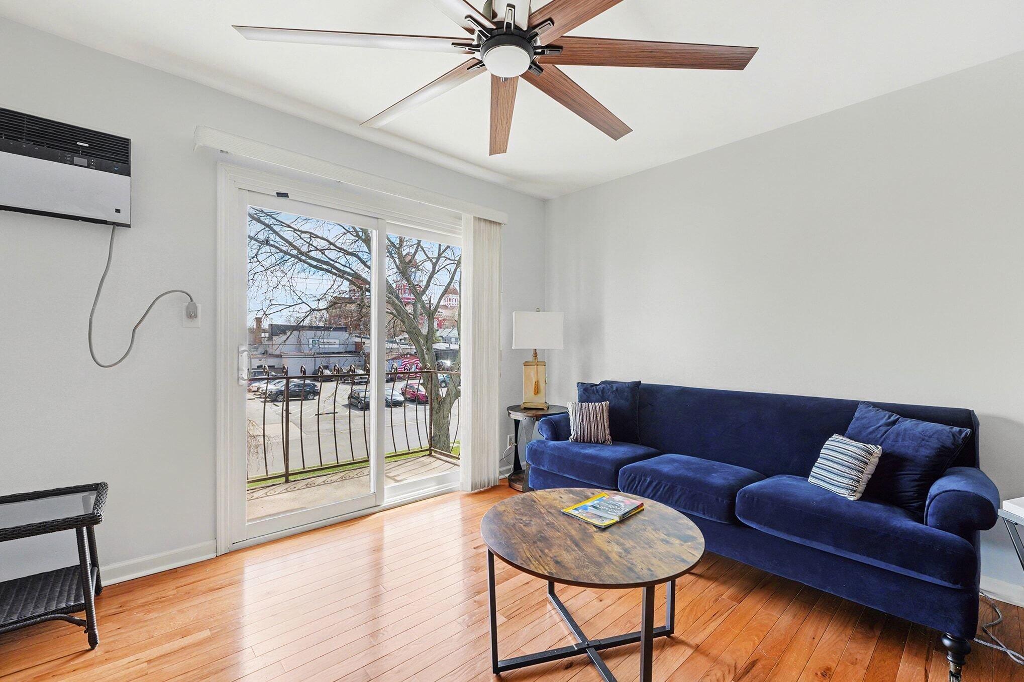 121 North West Street, Unit 22 Crown Point, IN 46307 - Photo 13 of 18 a living room with furniture and a large window
