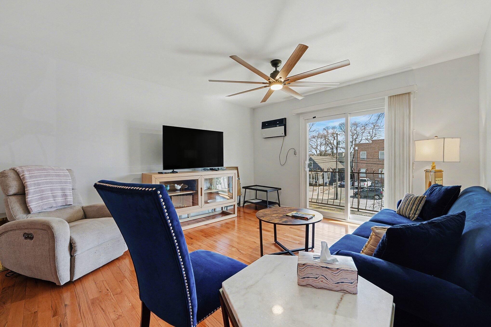 121 North West Street, Unit 22 Crown Point, IN 46307 - Photo 6 of 18 a living room with furniture and a flat screen tv