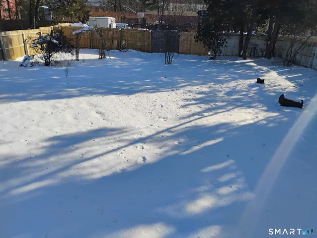 a view of a backyard of a house