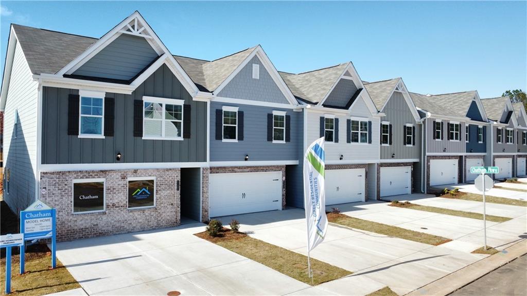 11734 Chatham Drive Hampton, GA 30228 - Photo 1 of 1 a front view of a house with a yard