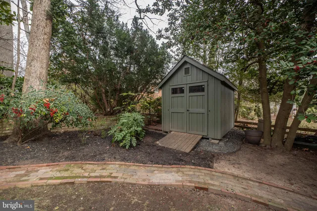 a view of swimming pool with outdoor seating and yard