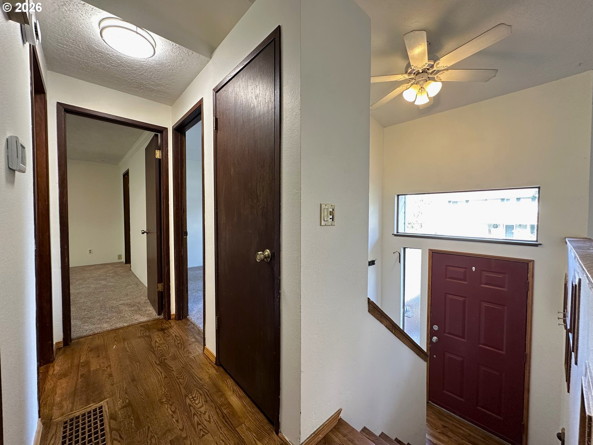 36350 Dubarko Road Sandy, OR 97055 - Photo 17 of 33 a view of a hallway with wooden floor