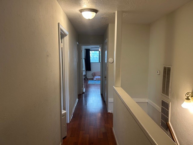 9615 Colleen Road Houston, TX 77080 - Photo 8 of 18 UPSTAIRS HALLWAY TO 3 BEDROOMS