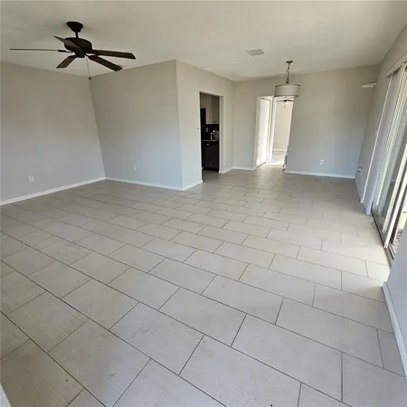 a view of a livingroom and a staircase