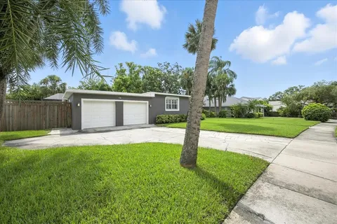 a view of a backyard with a garden