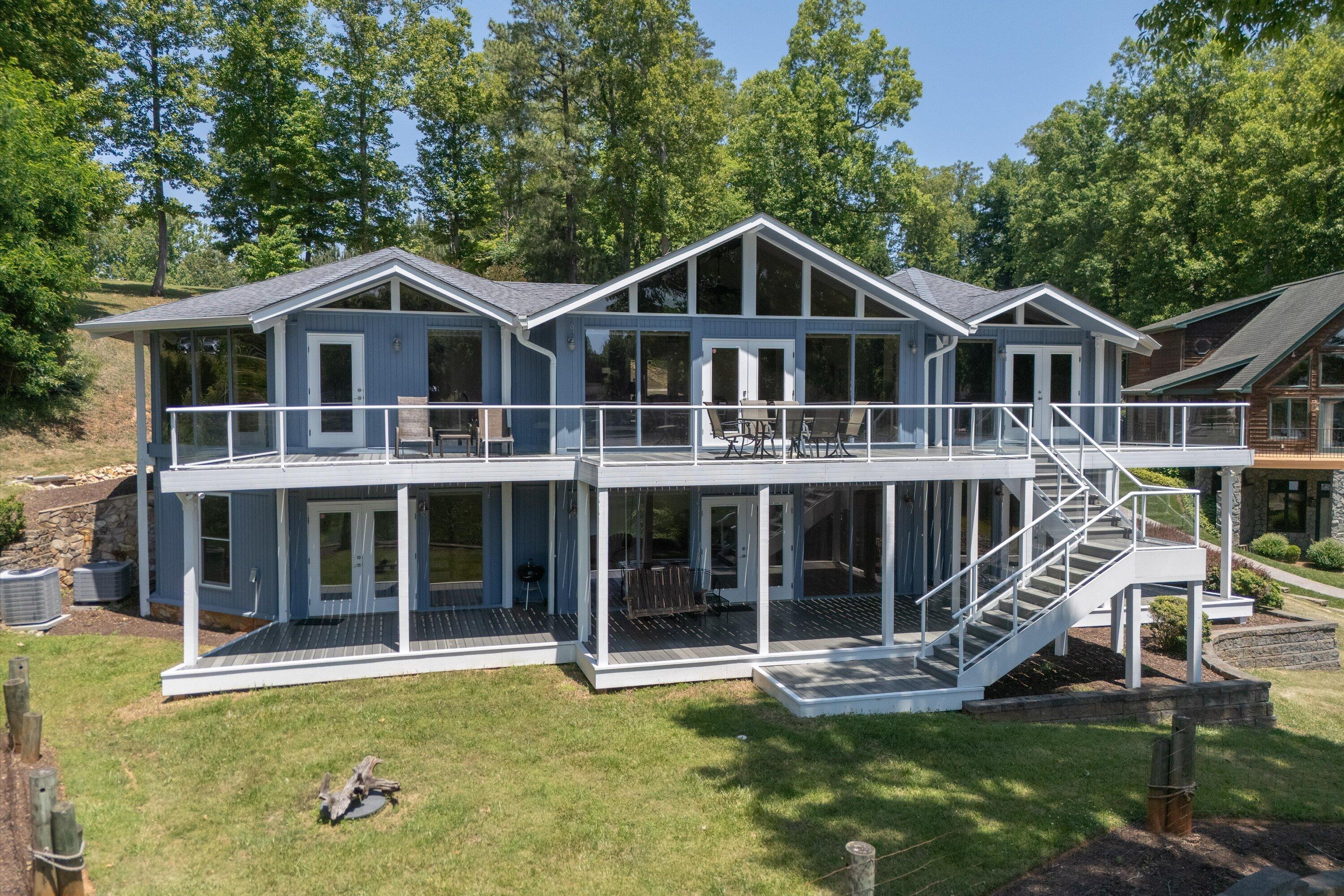 207 Winding Way Union Hall, VA 24176 - Photo 4 of 60 a view of a house with a yard and large tree